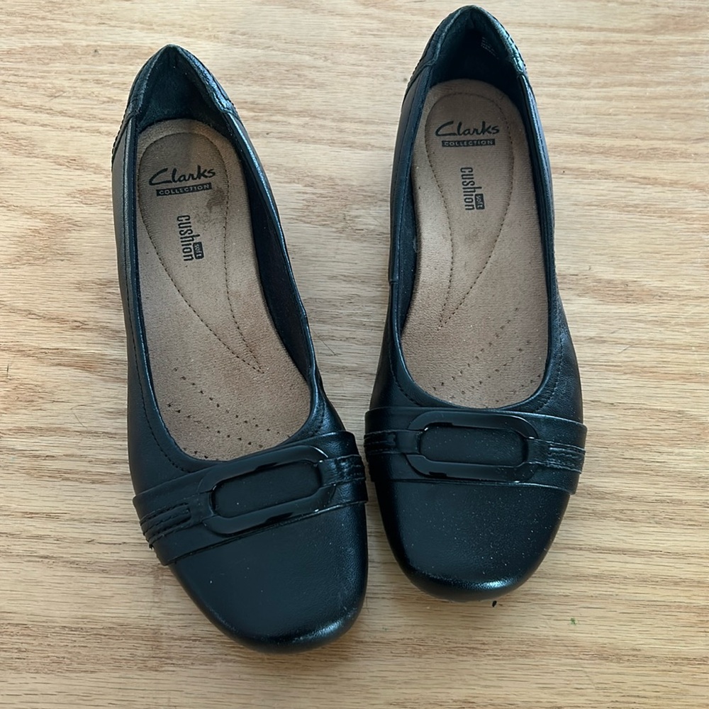 Clarks black leather slip-on shoes